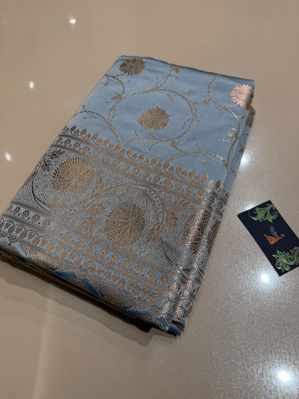 Powder Blue Banarasi Silk Blend Satin Saree with Copper Golden Zari Floral Jaal Weaving