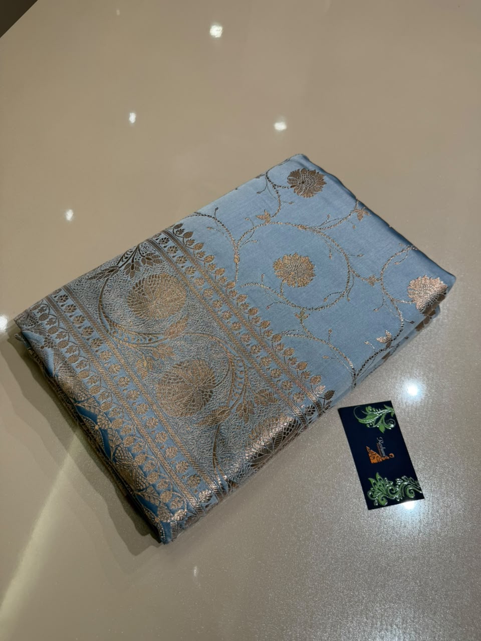 Powder Blue Banarasi Silk Blend Satin Saree with Copper Golden Zari Floral Jaal Weaving