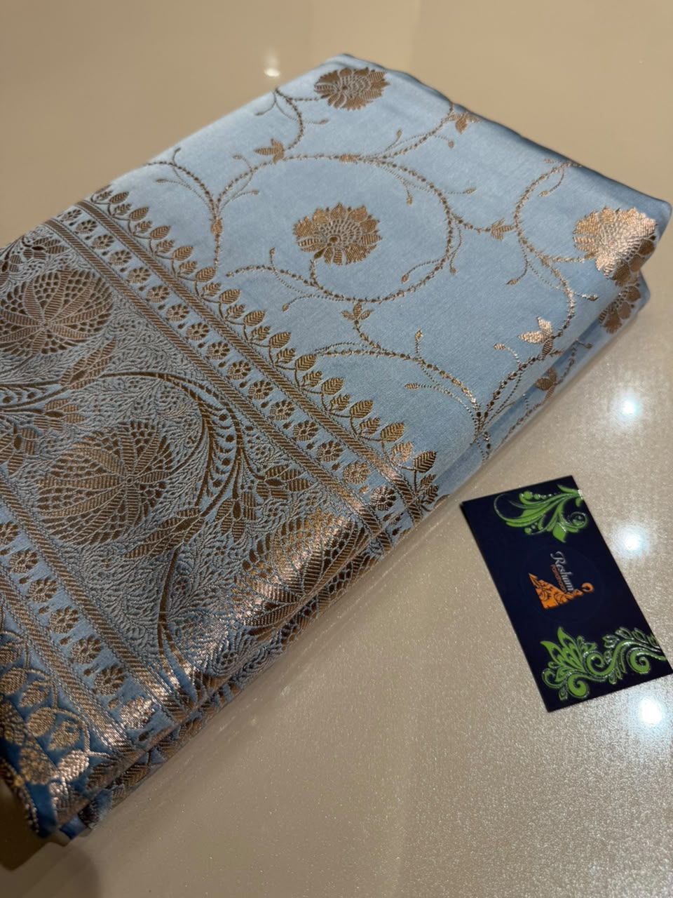 Powder Blue Banarasi Silk Blend Satin Saree with Copper Golden Zari Floral Jaal Weaving